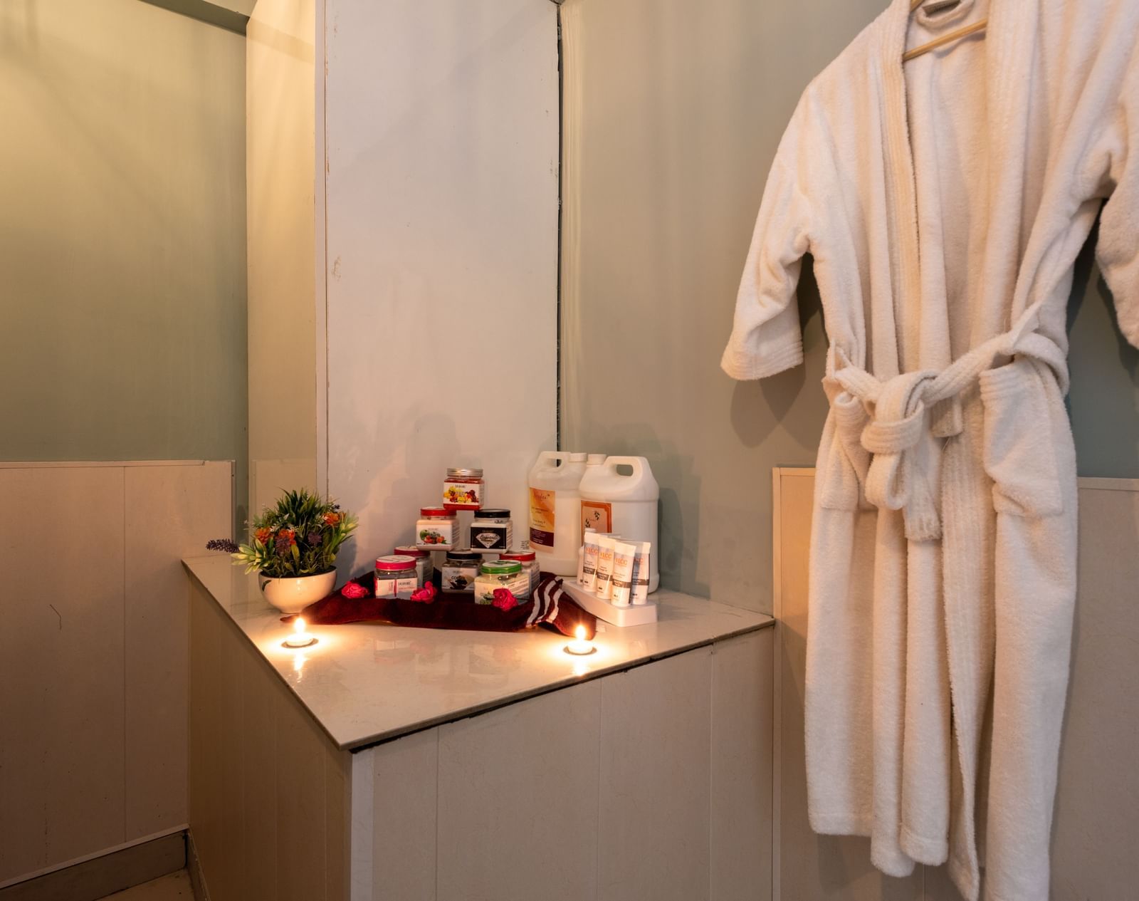View of essentials placed next to bathrobe at DLS Highland Resort and Spa, Mussoorie.